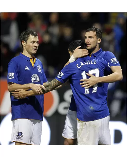 Everton's Victory Moment: Vellios, Bilyaletdinov, and Cahill Celebrate Second Goal Against Bolton Wanderers