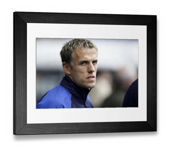 Framed Print : Phil Neville Leads Everton Against Bolton Wanderers in Barclays Premier League (November 2011)