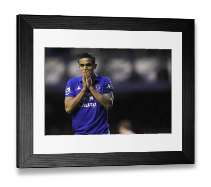 Framed Print : Tim Cahill's Disappointment: A Missed Goal Opportunity for Everton against Stoke City (04 December 2011) Framed Print : Tim Cahill's Disappointment: A Missed Goal Opportunity for Everton against Stoke City (04 December 2011)
