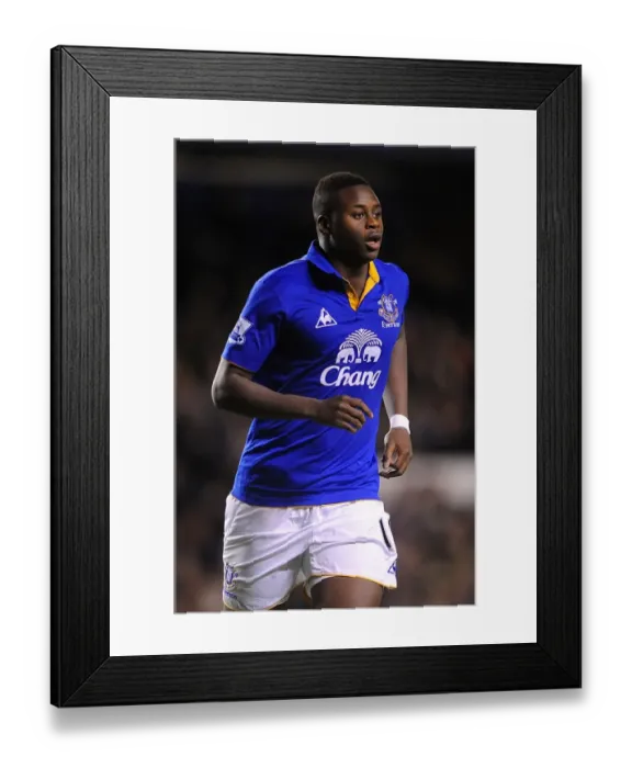 Framed Print : Determined Magaye Gueye Leads Everton to Victory: Everton vs Stoke City, Barclays Premier League (04 December 2011, Goodison Park)
