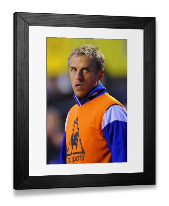 Framed Print : Phil Neville Leads Everton at Goodison Park Against Stoke City in Barclays Premier League (4 December 2011)