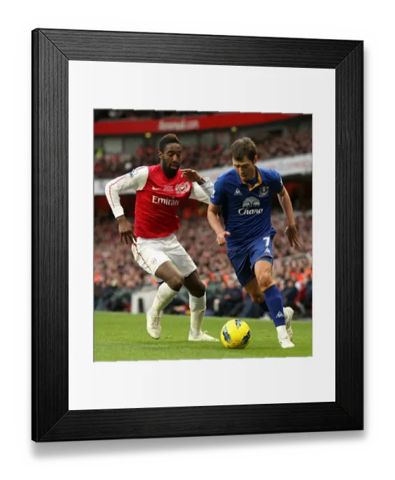 Framed Print : Clash at Emirates: A Battle Between Djourou and Bilyaletdinov (10 December 2011, Arsenal vs. Everton, Premier League) Framed Print : Clash at Emirates: A Battle Between Djourou and Bilyaletdinov (10 December 2011, Arsenal vs. Everton, Premier League)