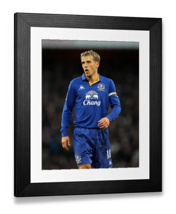 Framed Print : Phil Neville vs. Arsenal: Facing Off at Emirates Stadium during the Barclays Premier League Match (10 December 2011) Framed Print : Phil Neville vs. Arsenal: Facing Off at Emirates Stadium during the Barclays Premier League Match (10 December 2011)