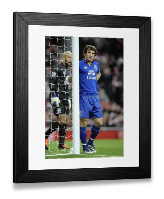 Framed Print : Intense Rivalry: Leighton Baines vs. Arsenal at Emirates Stadium (10 December 2011) Framed Print : Intense Rivalry: Leighton Baines vs. Arsenal at Emirates Stadium (10 December 2011)