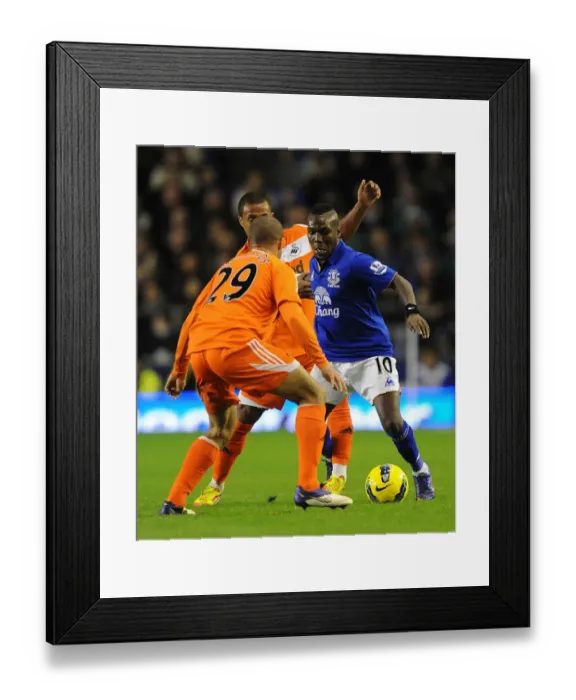 Framed Print : Intense Rivalry: Royston Drenthe vs Wayne Routledge & Ashley Richards Battle for the Ball (Everton vs Swansea City, BPL, Goodison Park, 21 December 2011) Framed Print : Intense Rivalry: Royston Drenthe vs Wayne Routledge & Ashley Richards Battle for the Ball (Everton vs Swansea City, BPL, Goodison Park, 21 December 2011)