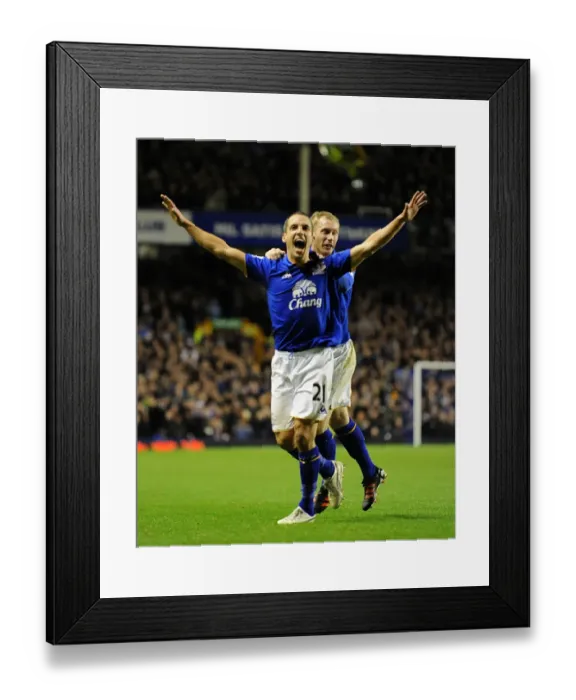 Framed Print : Osman and Hibbert: Everton's Celebration of the Opening Goal vs Swansea City (December 21, 2011)