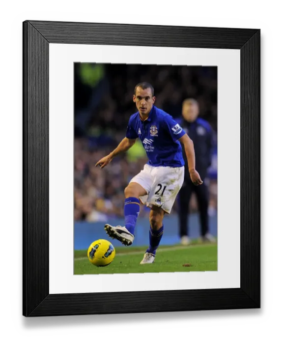 Framed Print : Decisive Moment: Leon Osman Scores Game-Winning Goal for Everton Against Norwich City (17 December 2011)