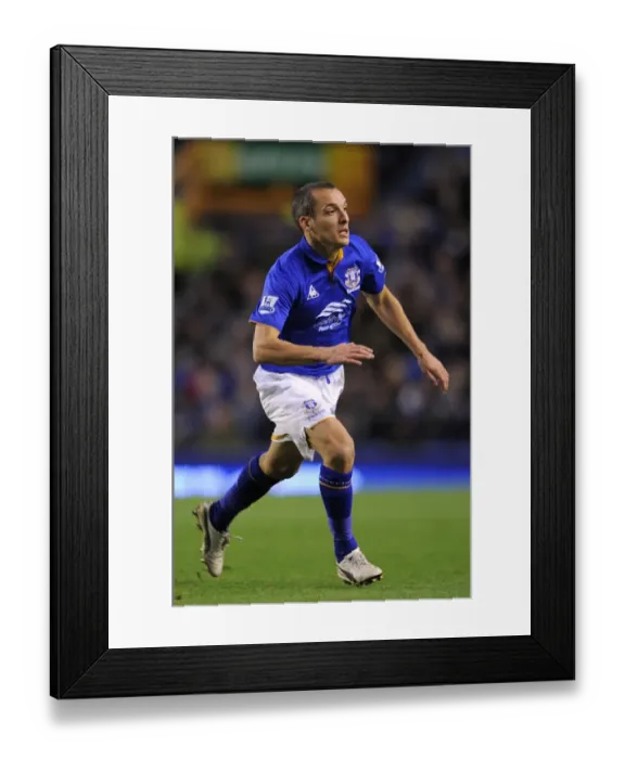 Framed Print : Determined Leon Osman: Everton's Standout Performance Against Norwich City (17 December 2011, Goodison Park, Barclays Premier League)