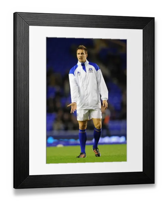 Framed Print : Everton's Jagielka in Focus: Pre-Match Warm-Up at Goodison Park (Everton vs Swansea City, Barclays Premier League, 21 December 2011) Framed Print : Everton's Jagielka in Focus: Pre-Match Warm-Up at Goodison Park (Everton vs Swansea City, Barclays Premier League, 21 December 2011)
