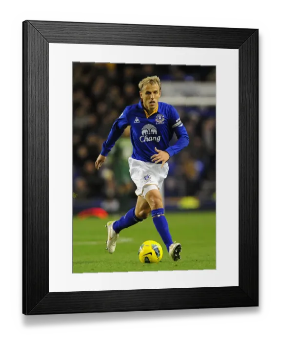 Framed Print : Phil Neville at Goodison Park: Everton vs Swansea City - Barclays Premier League (21 December 2011)