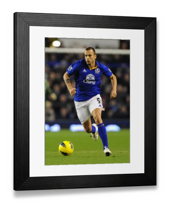 Framed Print : Heitinga's Unyielding Spirit: Everton's Victory Over Swansea City (21 December 2011) Framed Print : Heitinga's Unyielding Spirit: Everton's Victory Over Swansea City (21 December 2011)