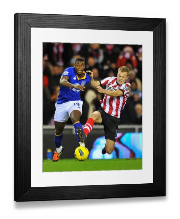 Framed Print : Battle for the Ball: Magaye Gueye vs. Sebastian Larsson - Everton vs. Sunderland, Premier League (December 26, 2011)