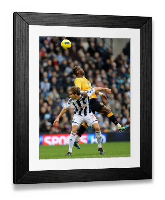 Framed Print : Battle for the Ball: Saha vs Morrison - Everton vs West Bromwich Albion (01 January 2012) Framed Print : Battle for the Ball: Saha vs Morrison - Everton vs West Bromwich Albion (01 January 2012)