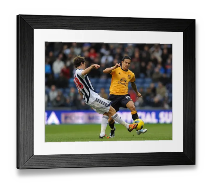 Framed Print : Battle for the Ball: Tim Cahill vs. Billy Jones - Everton vs. West Bromwich Albion, Premier League (01 January 2012) Framed Print : Battle for the Ball: Tim Cahill vs. Billy Jones - Everton vs. West Bromwich Albion, Premier League (01 January 2012)