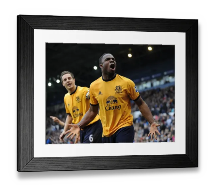 Framed Print : Everton's Victor Anichebe Scores Opening Goal vs. West Bromwich Albion (01 January 2012) Framed Print : Everton's Victor Anichebe Scores Opening Goal vs. West Bromwich Albion (01 January 2012)