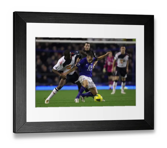 Framed Print : Battle for the Ball: Osman vs. Muamba - Everton vs. Bolton Wanderers (Barclays Premier League, Goodison Park, 04 January 2012) Framed Print : Battle for the Ball: Osman vs. Muamba - Everton vs. Bolton Wanderers (Barclays Premier League, Goodison Park, 04 January 2012)