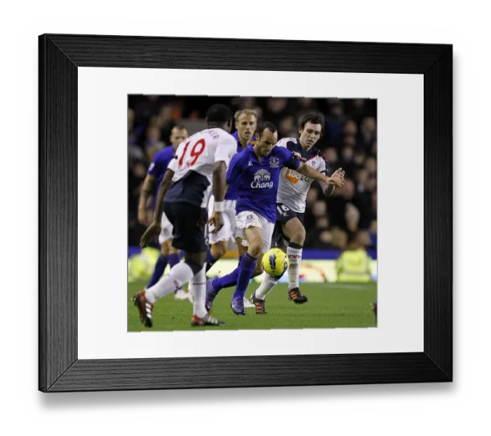 Framed Print : A Battle for the Ball: Donovan vs. Davies at Goodison Park (Everton vs. Bolton Wanderers, BPL, 04 January 2012) Framed Print : A Battle for the Ball: Donovan vs. Davies at Goodison Park (Everton vs. Bolton Wanderers, BPL, 04 January 2012)