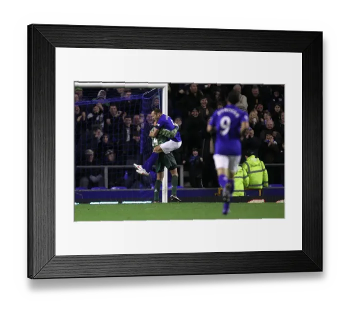 Framed Print : Everton's Unforgettable Goalkeeper Goal: Tim Howard Scores, Players Celebrate in Euphoria at Goodison Park (Everton vs. Bolton Wanderers, Barclays Premier League, 04 January 2012)