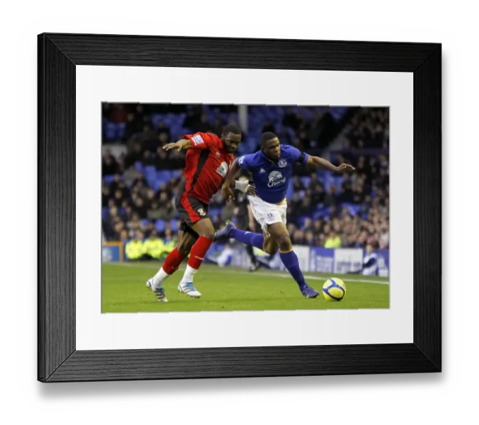 Framed Print : Everton vs Tamworth: A FA Cup Battle - Anichebe vs Kanyuka's Intense Rivalry for Ball Possession (January 2012) Framed Print : Everton vs Tamworth: A FA Cup Battle - Anichebe vs Kanyuka's Intense Rivalry for Ball Possession (January 2012)