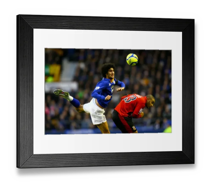 Framed Print : Intense Battle: Fellaini vs. Christie at Goodison Park - Everton vs. Tamworth's FA Cup Clash (January 2012) Framed Print : Intense Battle: Fellaini vs. Christie at Goodison Park - Everton vs. Tamworth's FA Cup Clash (January 2012)
