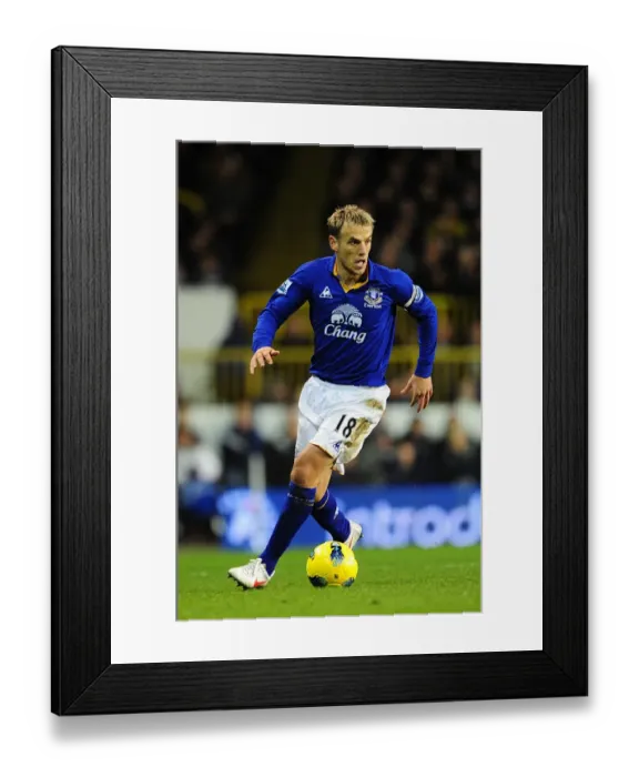 Framed Print : Phil Neville vs. Tottenham Hotspur: Everton's Fierce Face-Off in Premier League Clash (11 January 2012) Framed Print : Phil Neville vs. Tottenham Hotspur: Everton's Fierce Face-Off in Premier League Clash (11 January 2012)