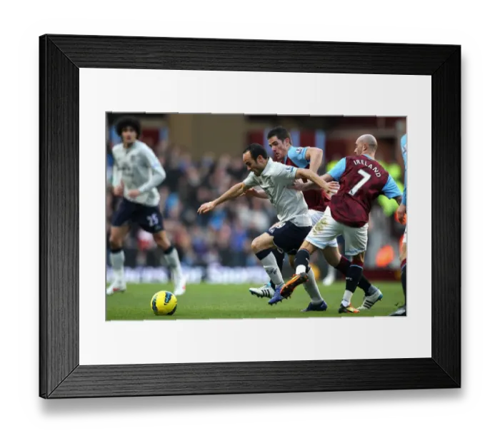 Framed Print : Clash at Villa Park: Landon Donovan Fights for Possession against Ciaran Clark and Stephen Ireland Framed Print : Clash at Villa Park: Landon Donovan Fights for Possession against Ciaran Clark and Stephen Ireland