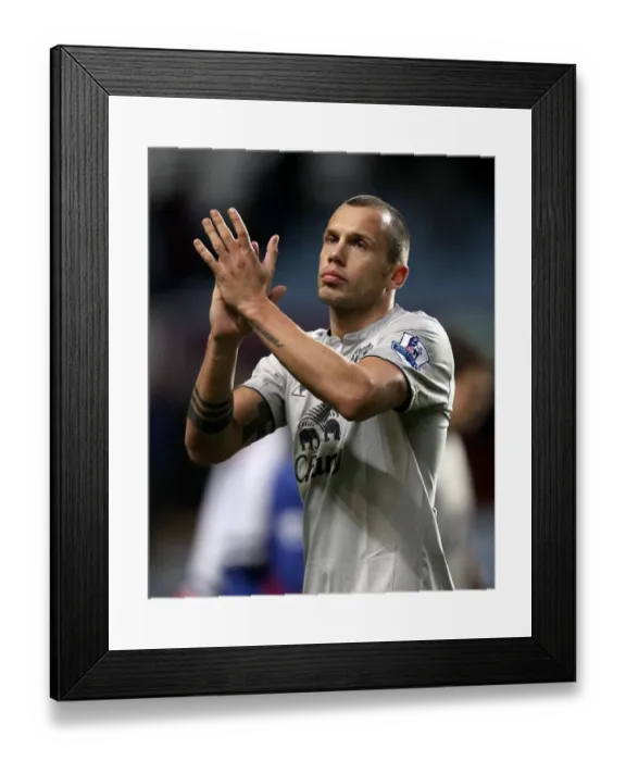 Framed Print : Everton's Heitinga Salutes Fans: A Victory Moment at Villa Park (14 January 2012)