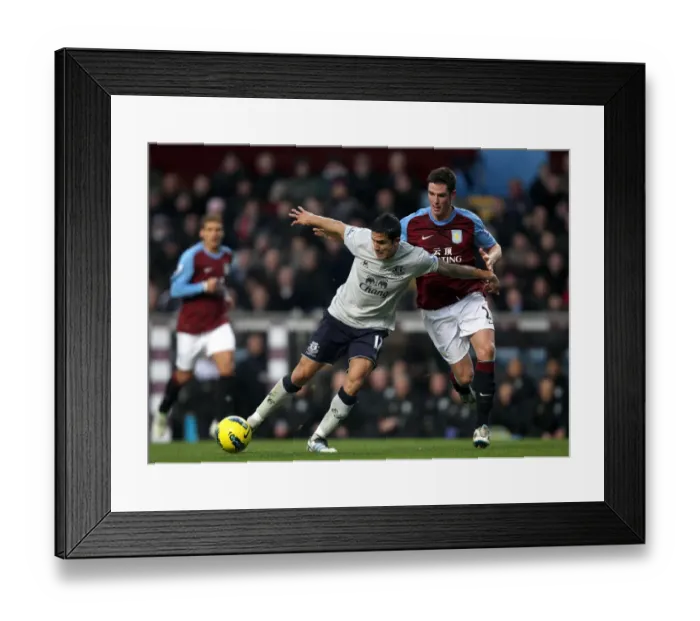 Framed Print : Clash at Villa Park: Tim Cahill vs. Ciaran Clark - Everton vs. Aston Villa, Premier League (2012)