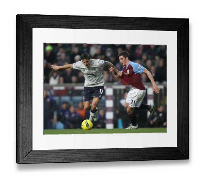 Framed Print : Intense Battle for Ball Possession: Tim Cahill vs. Ciaran Clark - Everton vs. Aston Villa (Premier League, 2012) Framed Print : Intense Battle for Ball Possession: Tim Cahill vs. Ciaran Clark - Everton vs. Aston Villa (Premier League, 2012)