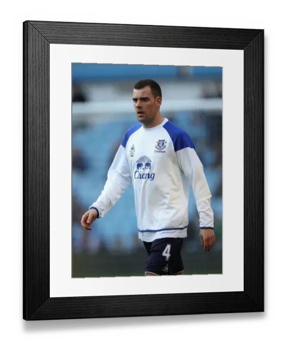 Framed Print : Everton's Darron Gibson Goes Head-to-Head in Barclays Premier League Showdown at Villa Park (14 January 2012) Framed Print : Everton's Darron Gibson Goes Head-to-Head in Barclays Premier League Showdown at Villa Park (14 January 2012)
