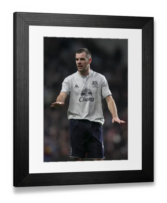 Framed Print : Everton's Darron Gibson in Action: Premier League Showdown vs. Aston Villa (January 2012)