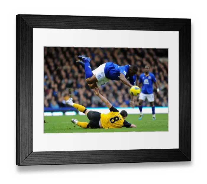 Framed Print : David Dunn's Sliding Tackle on Victor Anichebe: Everton vs. Blackburn Rovers, Premier League (21 January 2012) Framed Print : David Dunn's Sliding Tackle on Victor Anichebe: Everton vs. Blackburn Rovers, Premier League (21 January 2012)
