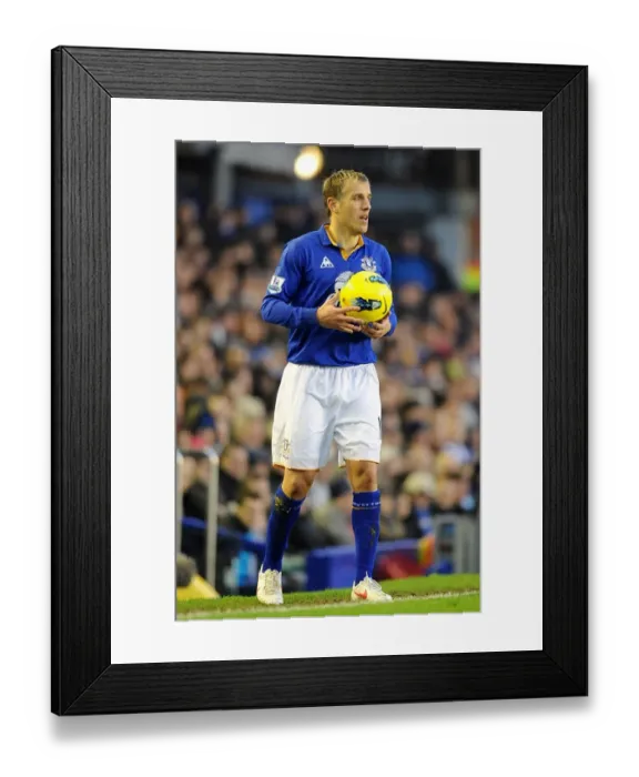 Framed Print : Intense Clash: Everton vs Blackburn Rovers - Phil Neville at Goodison Park (Barclays Premier League)