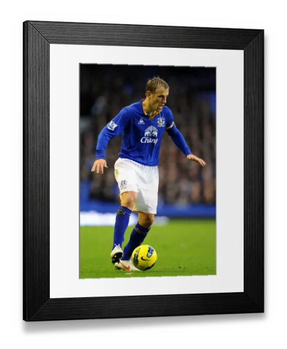 Framed Print : Phil Neville's Intense Battle: Everton vs Blackburn Rovers at Goodison Park (Premier League) Framed Print : Phil Neville's Intense Battle: Everton vs Blackburn Rovers at Goodison Park (Premier League)