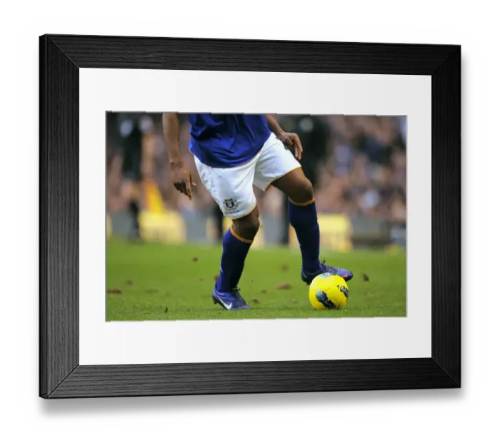 Framed Print : Intense Battle at Goodison Park: Everton Player in Command Framed Print : Intense Battle at Goodison Park: Everton Player in Command
