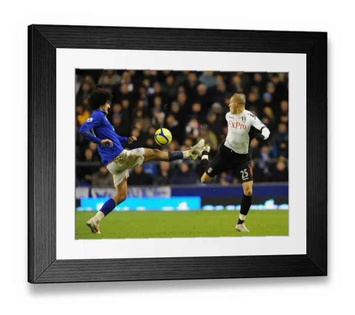 Framed Print : Fierce Rivalry: Marouane Fellaini vs. Bobby Zamora - Everton vs. Fulham's Intense FA Cup Battle for the Ball Framed Print : Fierce Rivalry: Marouane Fellaini vs. Bobby Zamora - Everton vs. Fulham's Intense FA Cup Battle for the Ball