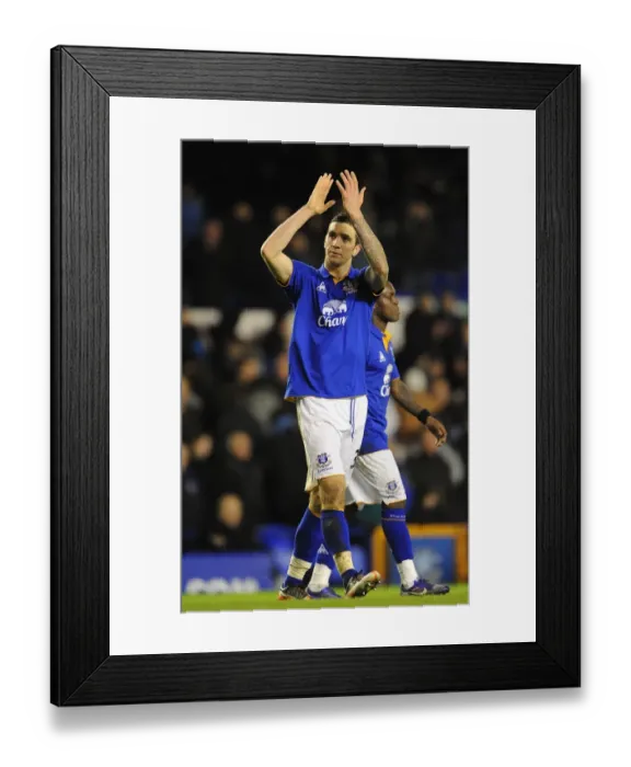 Framed Print : Shane Duffy's Euphoric Moment: Everton's FA Cup Victory Over Fulham (27 January 2012)