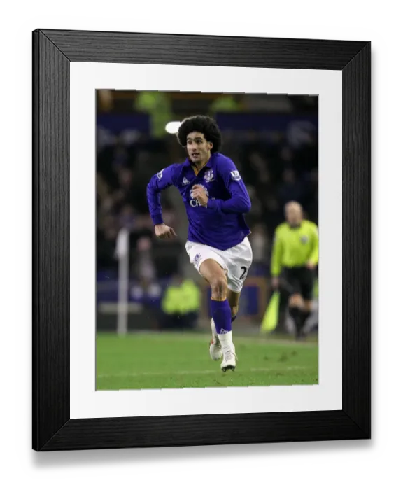 Framed Print : Marouane Fellaini's Thrilling Showdown: Everton vs Manchester City, Premier League Rivalry at Goodison Park (31 January 2012) Framed Print : Marouane Fellaini's Thrilling Showdown: Everton vs Manchester City, Premier League Rivalry at Goodison Park (31 January 2012)