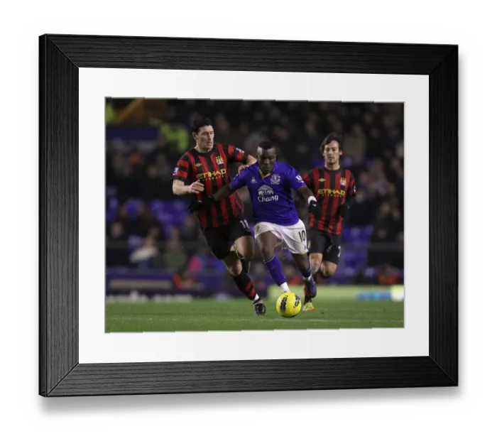 Framed Print : Clash of the Midfield Maestros: Gareth Barry vs Royston Drenthe - Everton vs Manchester City, Barclays Premier League (31 January 2012) Framed Print : Clash of the Midfield Maestros: Gareth Barry vs Royston Drenthe - Everton vs Manchester City, Barclays Premier League (31 January 2012)