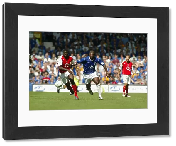Everton vs Arsenal, August 15, 2004, Barclays Premiership, Goodison Park - Intense Moment between Kevin Campbell and Unnamed Arsenal Player