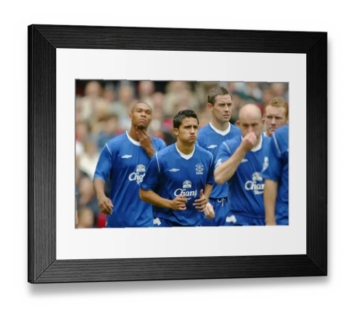 Framed Print : Manchester Rivalry: Tim Cahill in Action for Everton vs Manchester United at Old Trafford (Barclays Premiership 30.08.04) Framed Print : Manchester Rivalry: Tim Cahill in Action for Everton vs Manchester United at Old Trafford (Barclays Premiership 30.08.04)