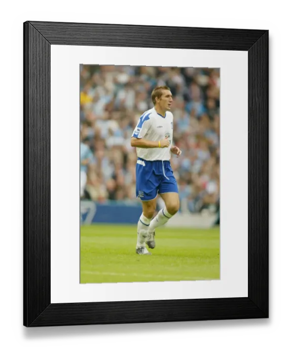 Framed Print : Alan Stubbs in Action for Everton vs Manchester City, Barclays Premiership, 2004 Framed Print : Alan Stubbs in Action for Everton vs Manchester City, Barclays Premiership, 2004