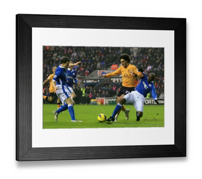 Framed Print : Everton's Fellaini Fights for Ball Against Wigan Athletic Duo in Premier League Clash