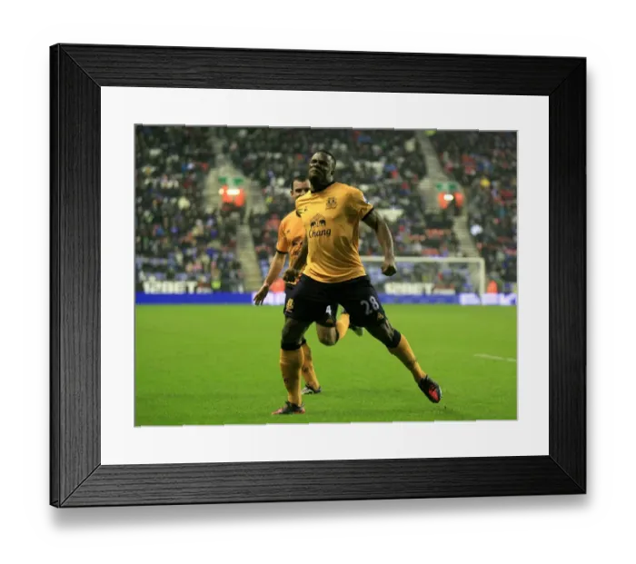 Framed Print : Victor Anichebe's Thrilling Goal Celebration: Everton's First Goal Against Wigan Athletic in Premier League (04 February 2012) Framed Print : Victor Anichebe's Thrilling Goal Celebration: Everton's First Goal Against Wigan Athletic in Premier League (04 February 2012)