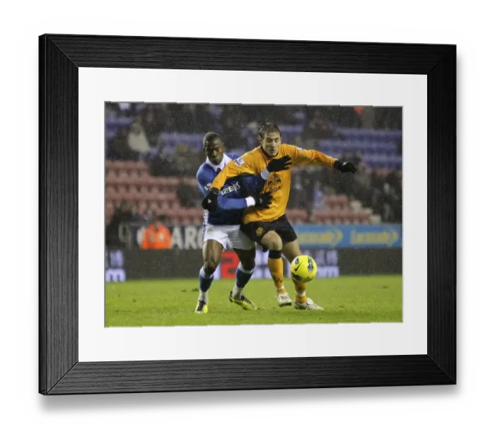 Framed Print : Figueroa vs. Jelavic: A Battle for Ball Supremacy - Wigan Athletic vs. Everton, Barclays Premier League (04 February 2012, DW Stadium) Framed Print : Figueroa vs. Jelavic: A Battle for Ball Supremacy - Wigan Athletic vs. Everton, Barclays Premier League (04 February 2012, DW Stadium)