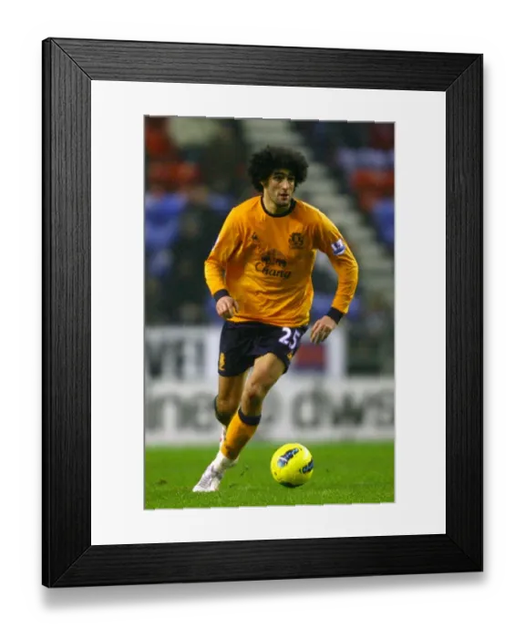Framed Print : Marouane Fellaini in Action: Everton vs. Wigan Athletic, Barclays Premier League (04 February 2012) Framed Print : Marouane Fellaini in Action: Everton vs. Wigan Athletic, Barclays Premier League (04 February 2012)