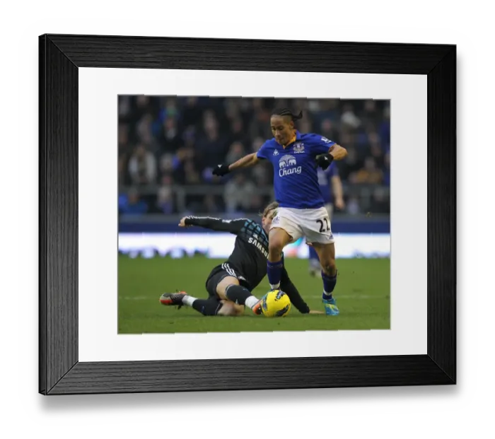 Framed Print : Battle at Goodison Park: Torres vs. Pienaar - A Premier League Clash Between Everton and Chelsea