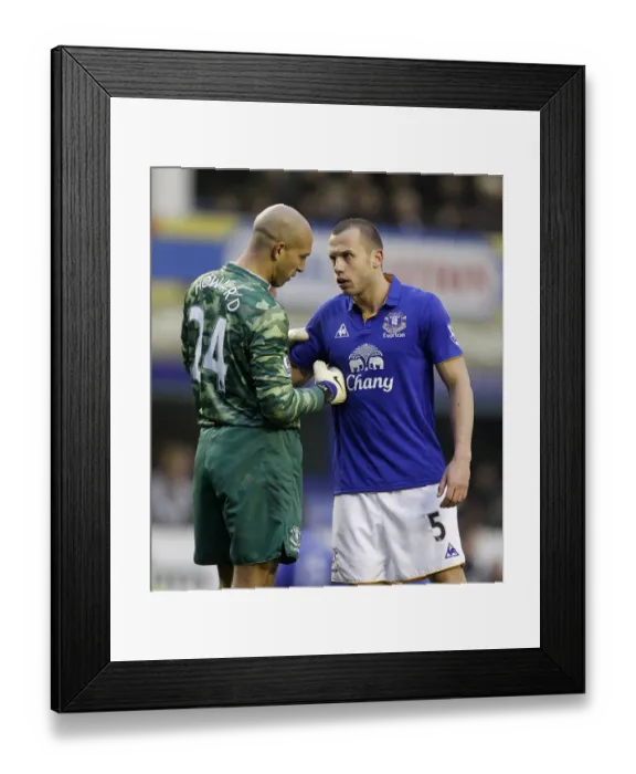 Framed Print : Everton's Howard and Heitinga Deep in Tactical Discussion at Goodison Park during Everton vs Chelsea (11 February 2012) Framed Print : Everton's Howard and Heitinga Deep in Tactical Discussion at Goodison Park during Everton vs Chelsea (11 February 2012)