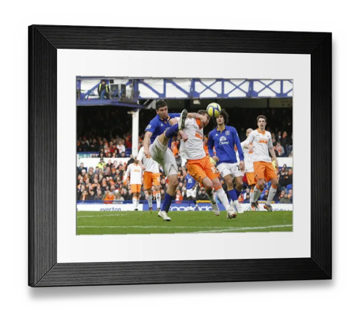 Framed Print : Stracqualursi vs Wilson: A FA Cup Battle at Everton's Goodison Park Framed Print : Stracqualursi vs Wilson: A FA Cup Battle at Everton's Goodison Park