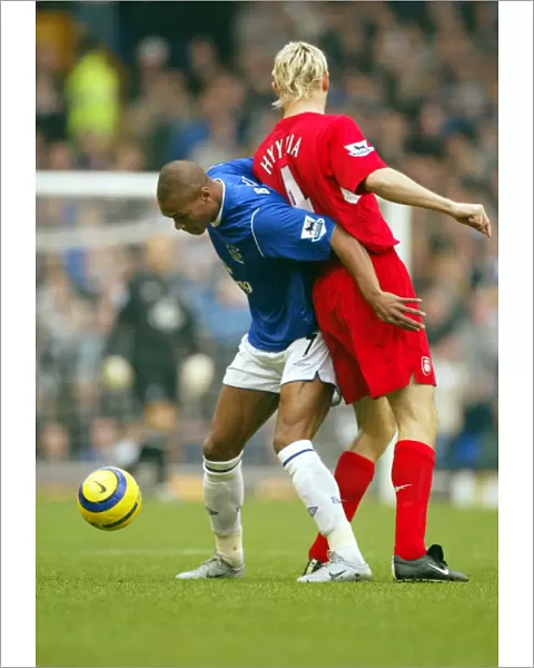 Marcus Bent shields the ball from Sami Hyypia